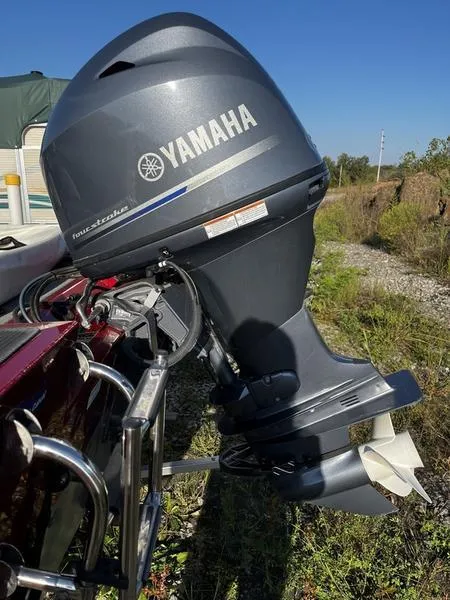 Slide: The Image of 2015 G3 Eagle 176 with Yamaha outboard motor in outdoor setting. - 5