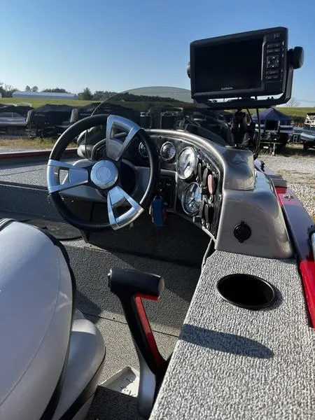 Slide: The Image of 2015 G3 Eagle 176 boat dashboard with steering wheel and navigation system. - 6