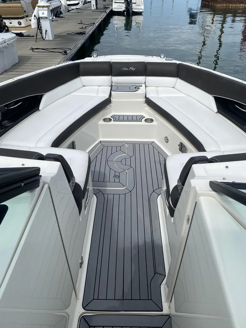 Slide: The Image of 2016 Sea Ray 350 SLX boat interior with sleek seating and modern design. - 11