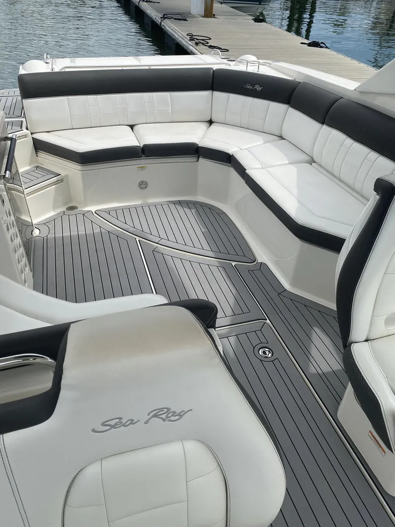 Slide: The Image of Luxurious seating on 2016 Sea Ray 350 SLX boat with sleek design and waterfront view. - 19