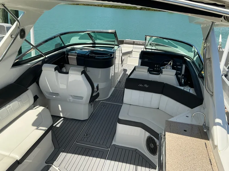 Slide: The Image of 2016 Sea Ray 350 SLX boat interior with luxurious seating and modern design. - 30