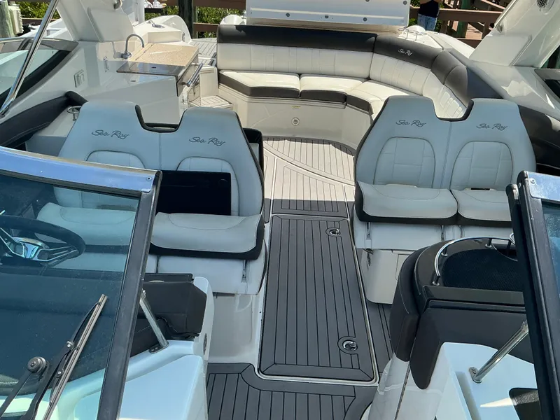 Slide: The Image of 2016 Sea Ray 350 SLX boat interior with luxurious seating and sleek design. - 39