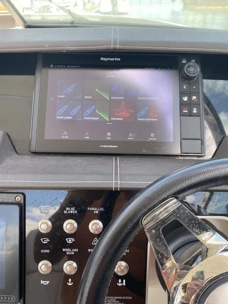 Slide: The Image of Control panel of a 2016 Sea Ray 350 SLX boat with navigation display. - 4