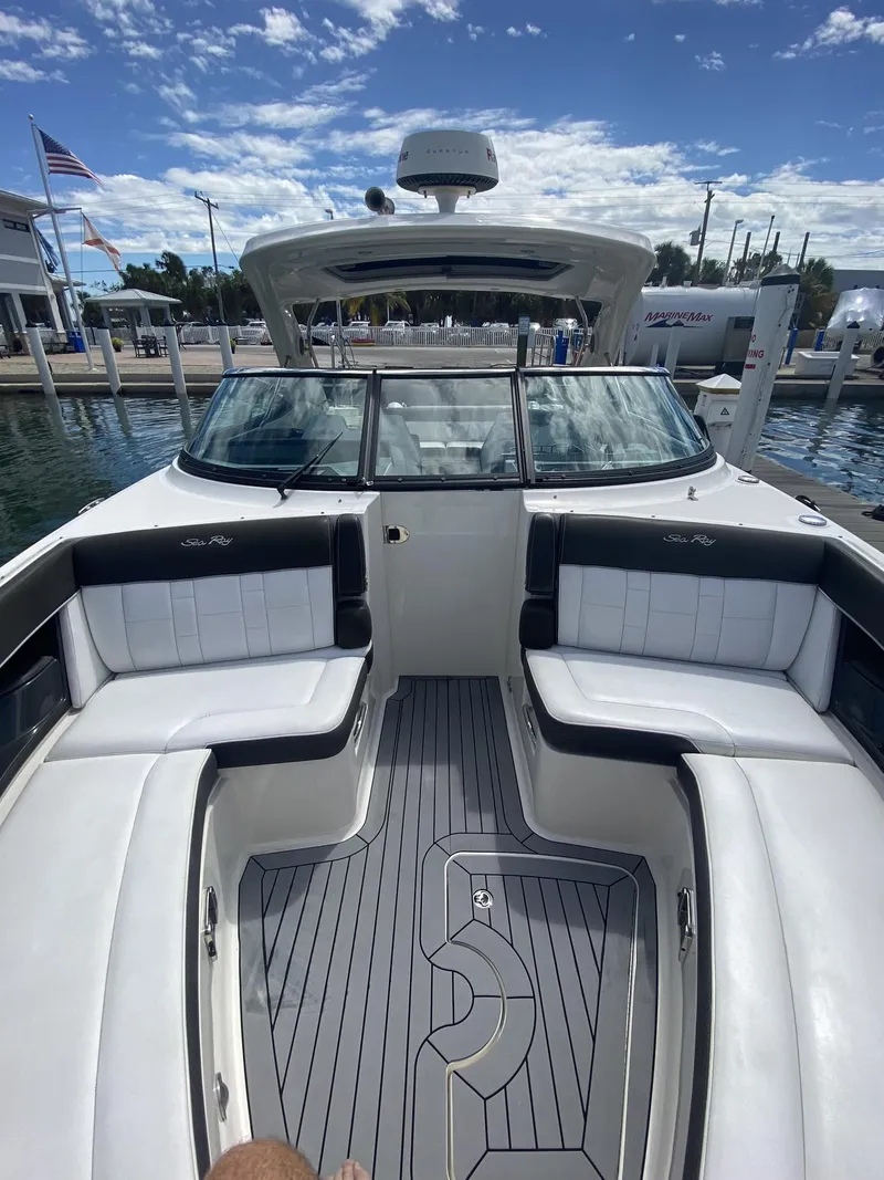 Slide: The Image of 2016 Sea Ray 350 SLX boat interior with sleek seating and modern design. - 5