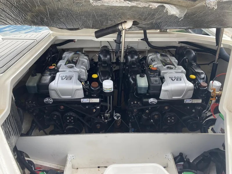Slide: The Image of 2016 Sea Ray 350 SLX boat engine compartment with dual V8 engines. - 9
