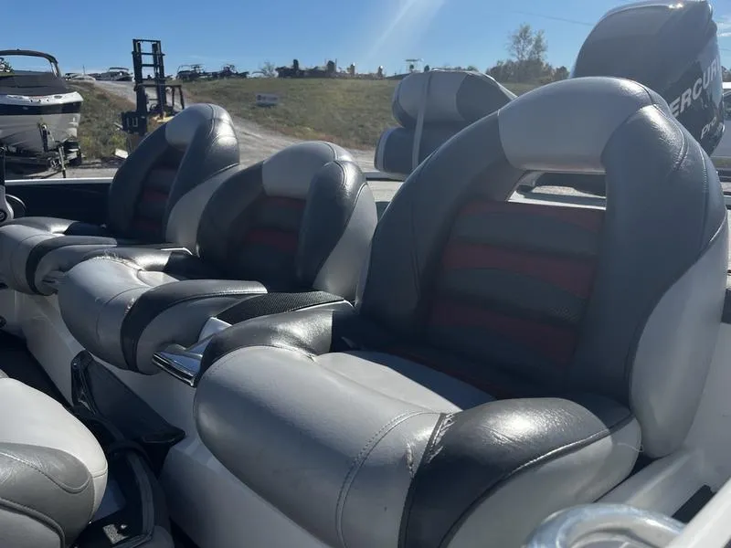 Slide: The Image of 2011 Nitro Z9 boat seats, gray and black leather, outdoor setting. - 3