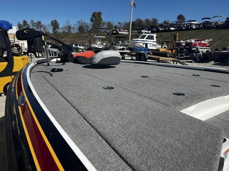 Slide: The Image of 2011 Nitro Z9 boat deck in a marina setting. - 4