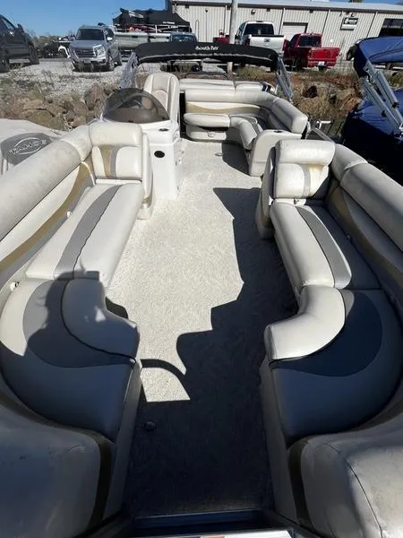 Slide: The Image of 2011 South Bay 522CR pontoon boat with spacious seating and modern design. - 3