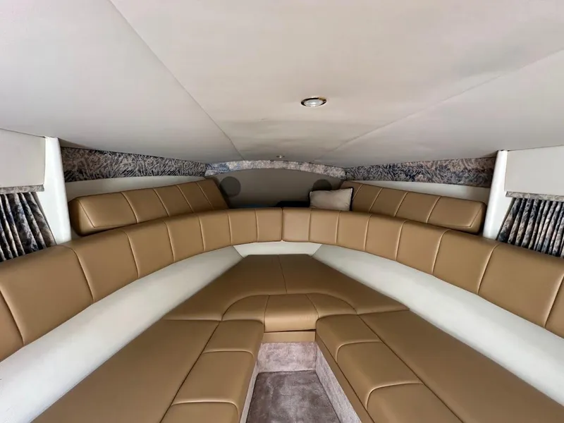 Slide: The Image of Interior of 2000 Formula 330 SS boat with tan leather seating. - 32