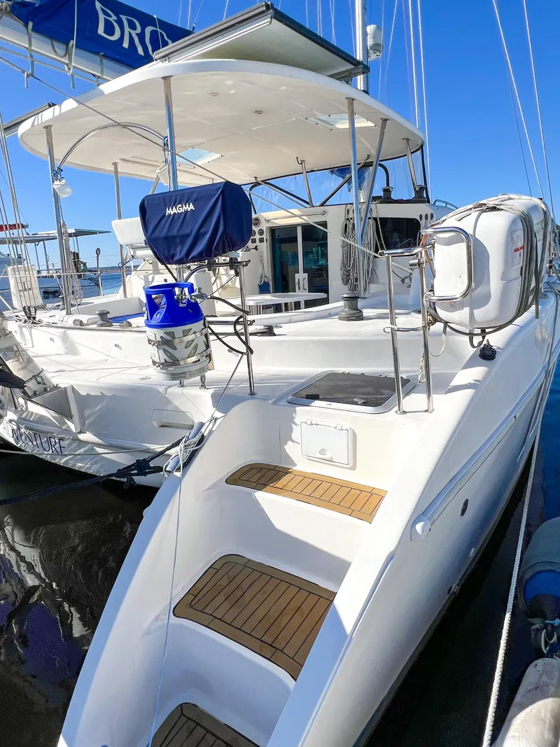 Slide: The Image of Broadblue 435 catamaran, 2010 model, docked with visible deck and equipment. - 18