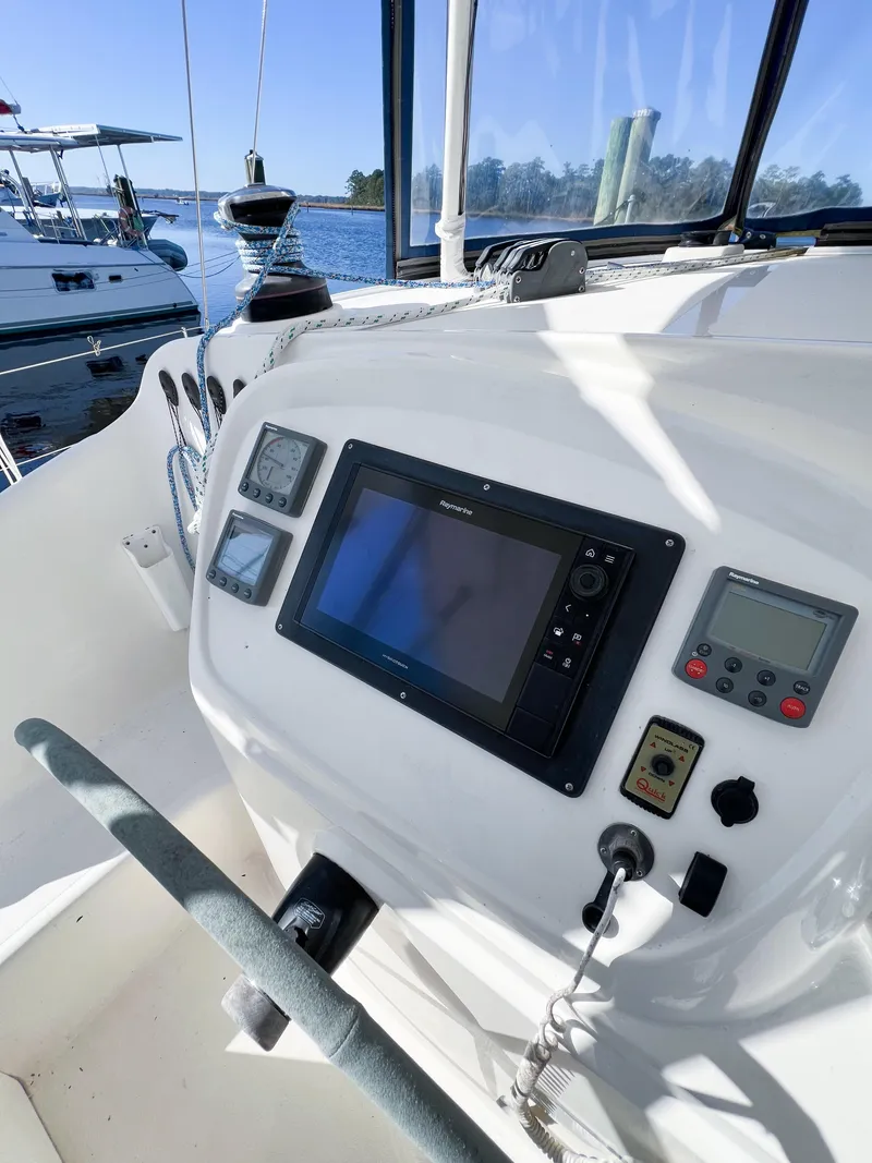 Slide: The Image of 2010 Broadblue 435 yacht helm with navigation instruments and controls. - 31