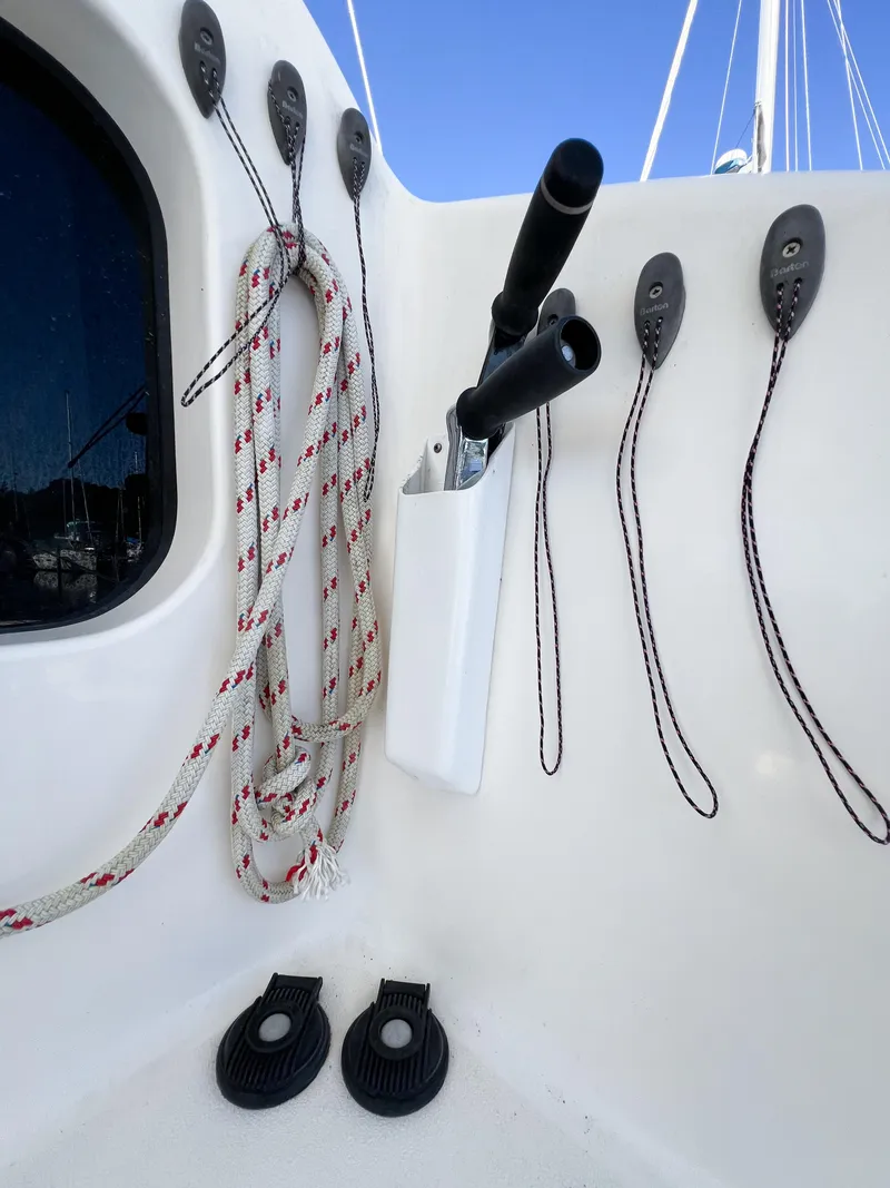 Slide: The Image of Broadblue 435 sailboat deck with ropes and winch handles, 2010 model. - 35