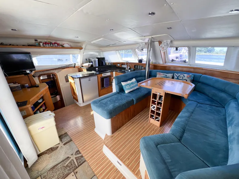 Slide: The Image of Spacious interior of 2010 Broadblue 435 catamaran with modern kitchen and comfortable seating area. - 40