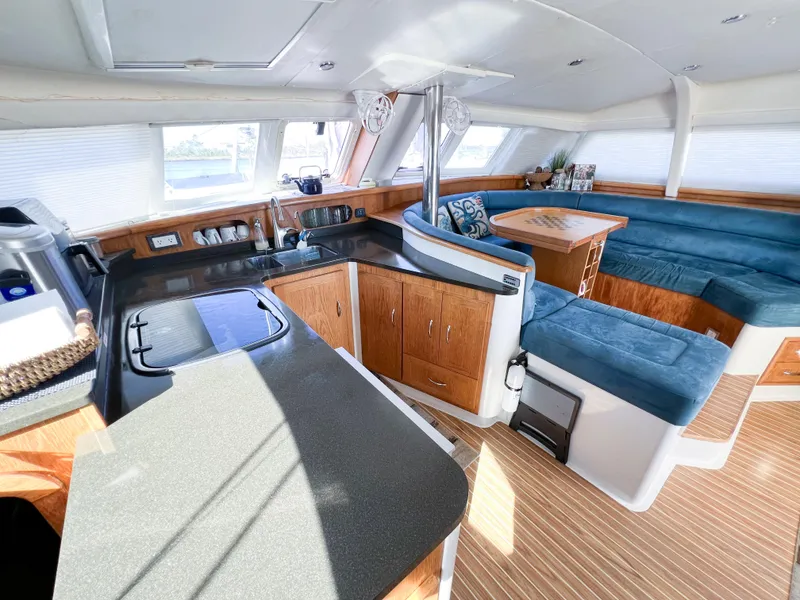 Slide: The Image of Spacious interior of 2010 Broadblue 435 catamaran with modern kitchen and seating area. - 42