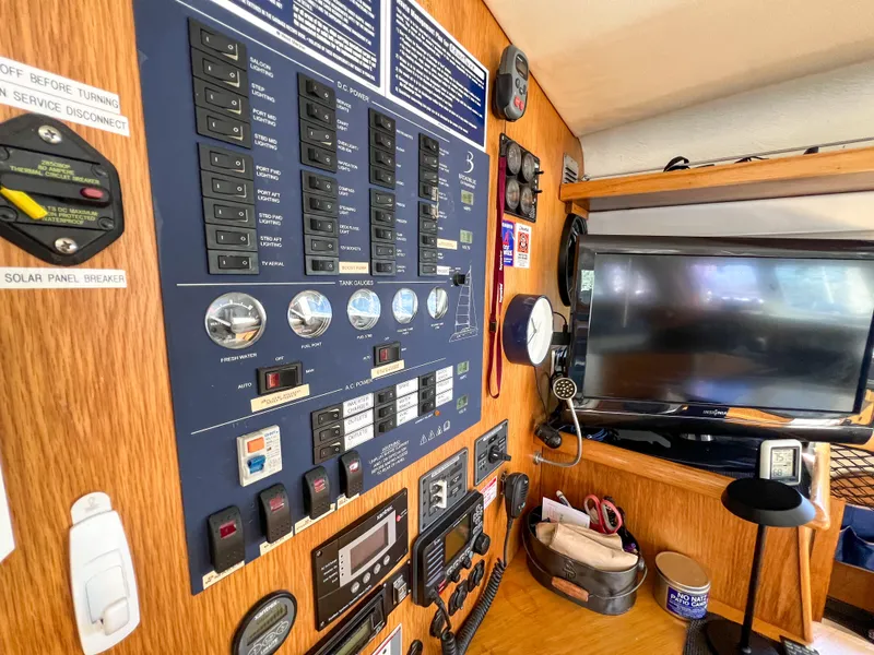 Slide: The Image of Control panel and electronics inside a 2010 Broadblue 435 catamaran. - 47