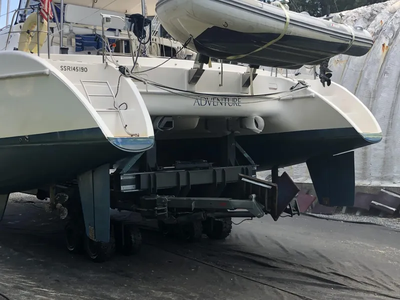 Slide: The Image of Broadblue 435 catamaran from 2010 on trailer, with dinghy on deck. - 9