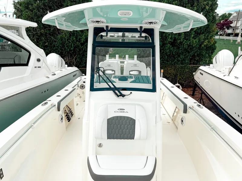 Slide: The Image of 2025 Cobia 285 Center Console boat with sleek design and modern features. - 19