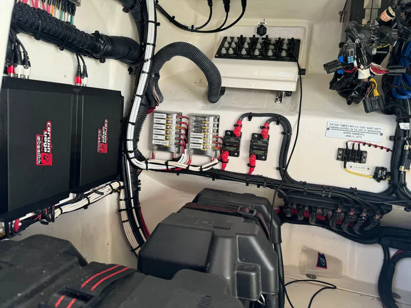 Slide: The Image of Electrical system of a 2011 Intrepid 370 Cuddy boat, showcasing wiring and components. - 18