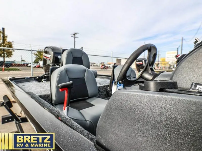 Slide: The Image of 2025 Pro 170 boat interior with steering wheel and seats at Bretz RV & Marine. - 14