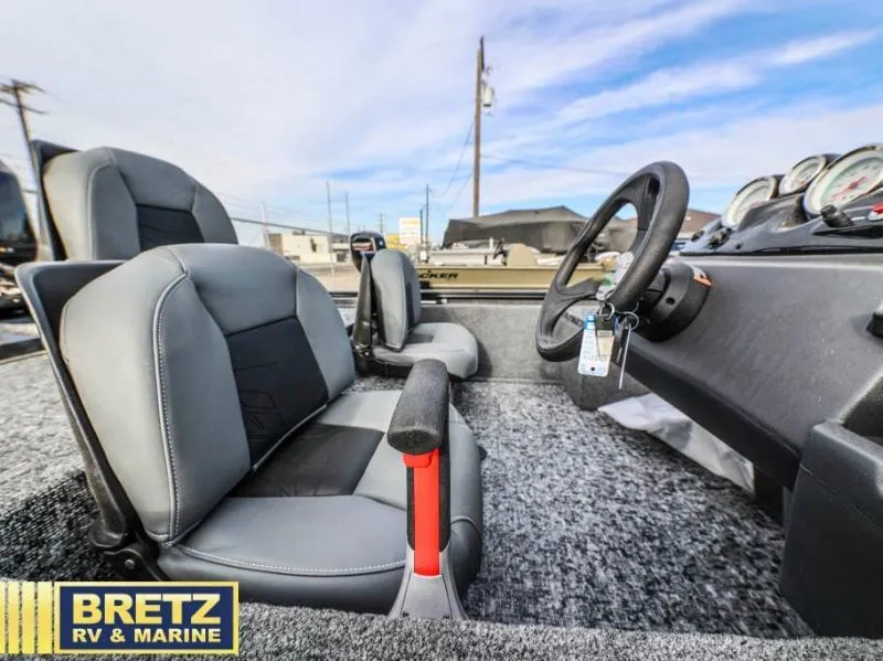 Slide: The Image of Interior of 2025 Pro 170 boat with steering wheel and seats, Bretz RV & Marine. - 15