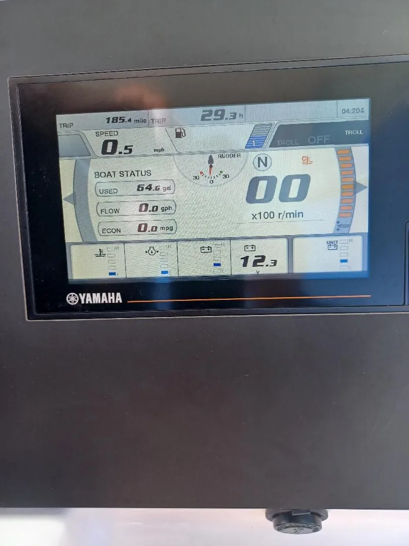 Slide: The Image of Yamaha boat display showing speed, RPM, and status on Everglades 243 Center Console, 2022 model. - 13