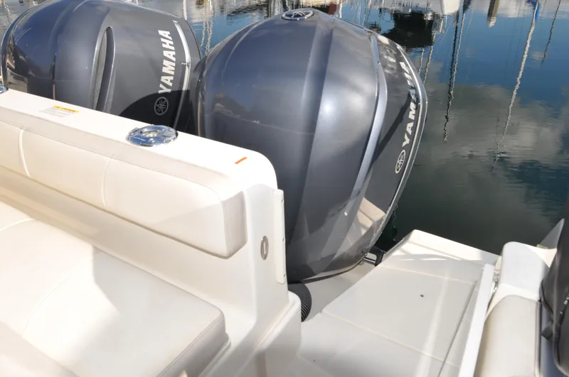Slide: The Image of 2014 Pursuit OS 315 Offshore boat with twin Yamaha outboard engines. - 27