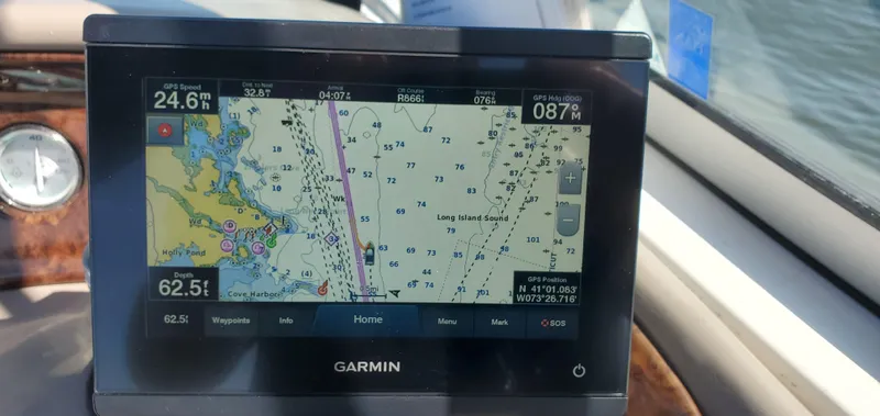 Slide: The Image of Garmin GPS display on 2002 Four Winns 240 Horizon boat, showing navigation map. - 8