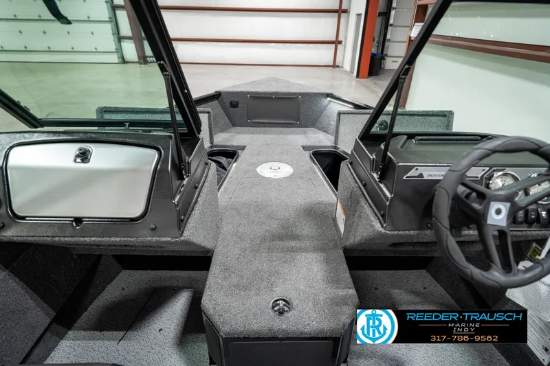 Slide: The Image of 2025 Lund 1775 Adventure Sport interior, featuring spacious cockpit and modern design. - 20