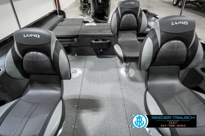 Slide: The Image of 2025 Lund 1775 Adventure Sport boat interior with four cushioned seats. - 26