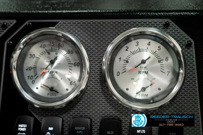 Slide: The Image of 2025 Lund 1775 Adventure Sport dashboard with speedometer and RPM gauges. - 32