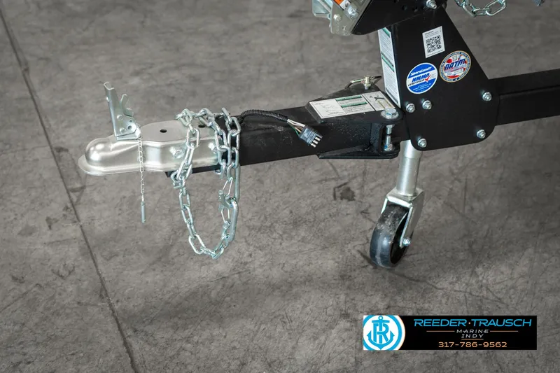 Slide: The Image of Trailer hitch of 2025 Lund 1775 Adventure Sport with safety chains and wheel. - 37