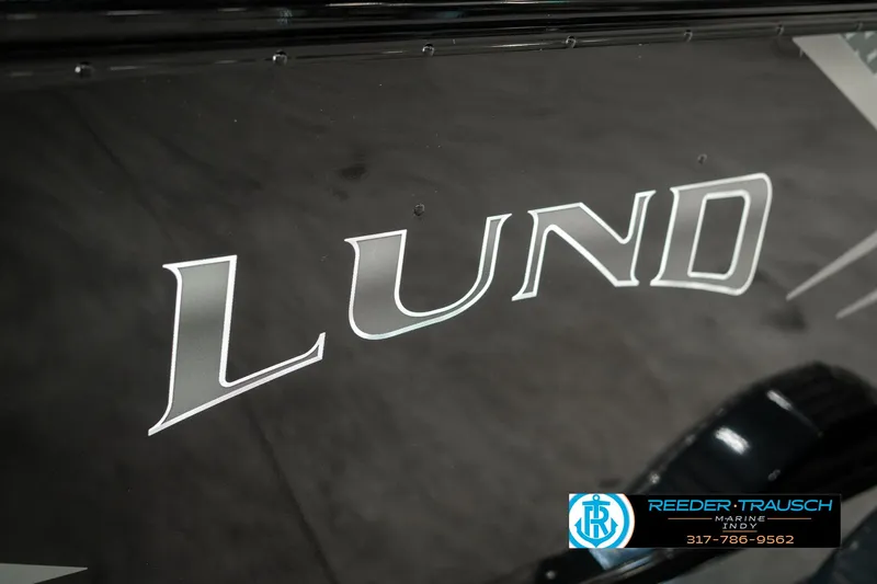 Slide: The Image of 2025 Lund 1775 Adventure Sport logo on a sleek black surface. - 44