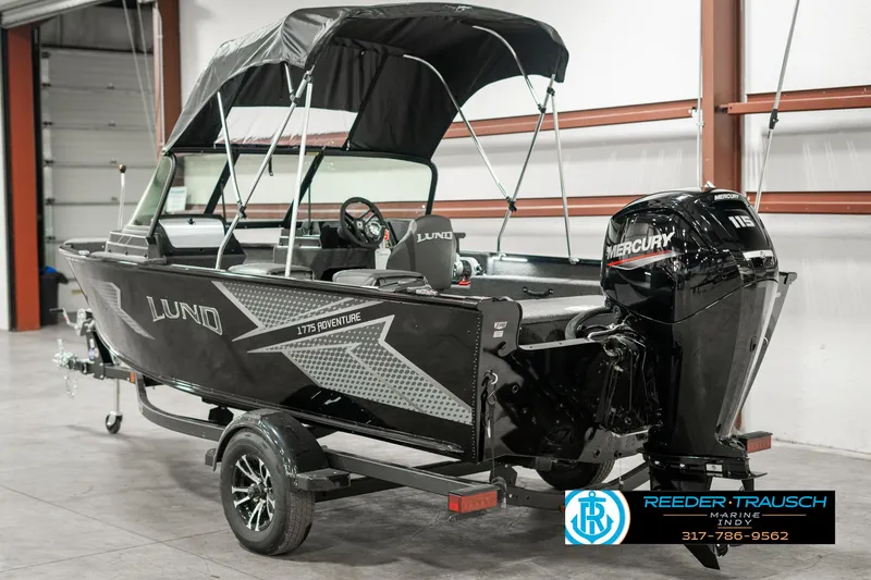 Slide: The Image of 2025 Lund 1775 Adventure Sport boat with Mercury engine in showroom. - 5