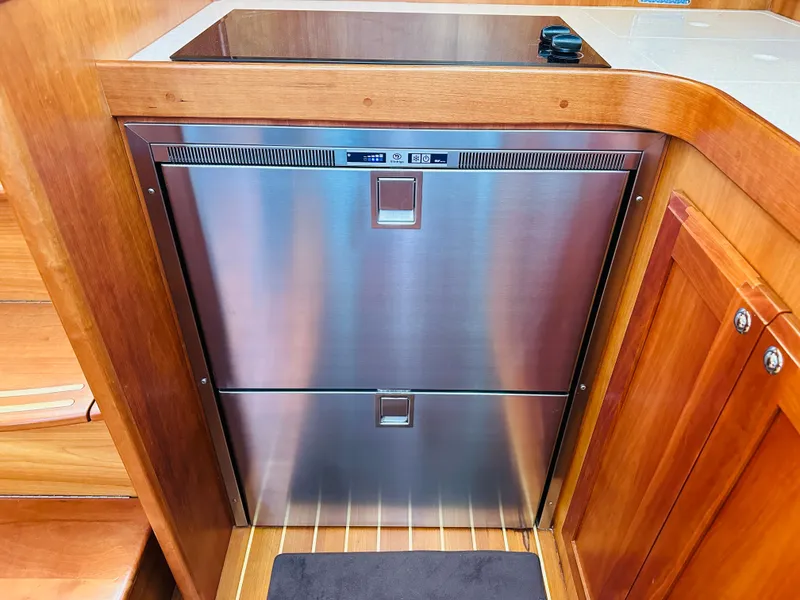 Slide: The Image of Stainless steel fridge in 2009 Sabre 42 Hardtop Express yacht interior. - 29