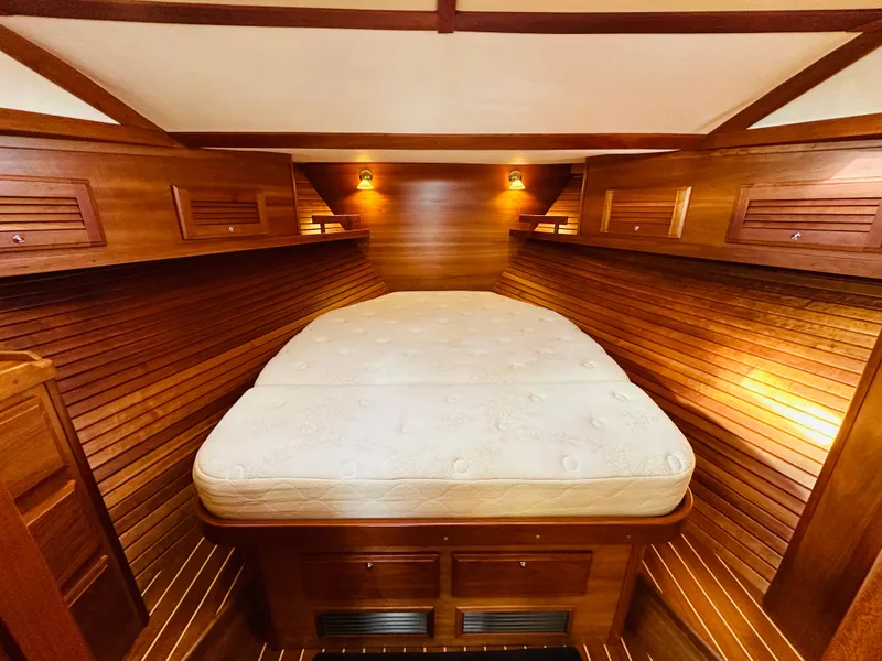 Slide: The Image of Luxurious wood-paneled cabin interior of 2009 Sabre 42 Hardtop Express yacht. - 33