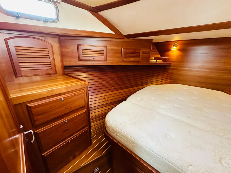 Slide: The Image of Luxurious wood-finished cabin interior of 2009 Sabre 42 Hardtop Express yacht. - 34