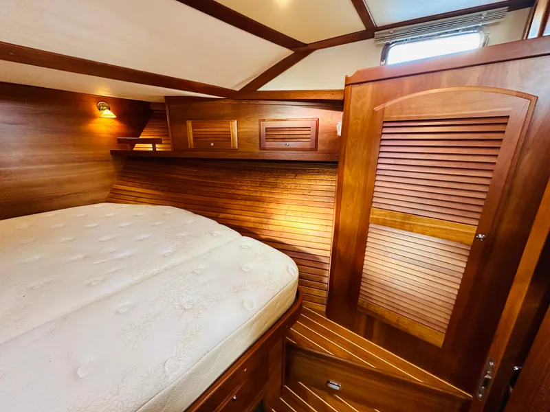 Slide: The Image of Luxurious wood interior of 2009 Sabre 42 Hardtop Express yacht cabin. - 35