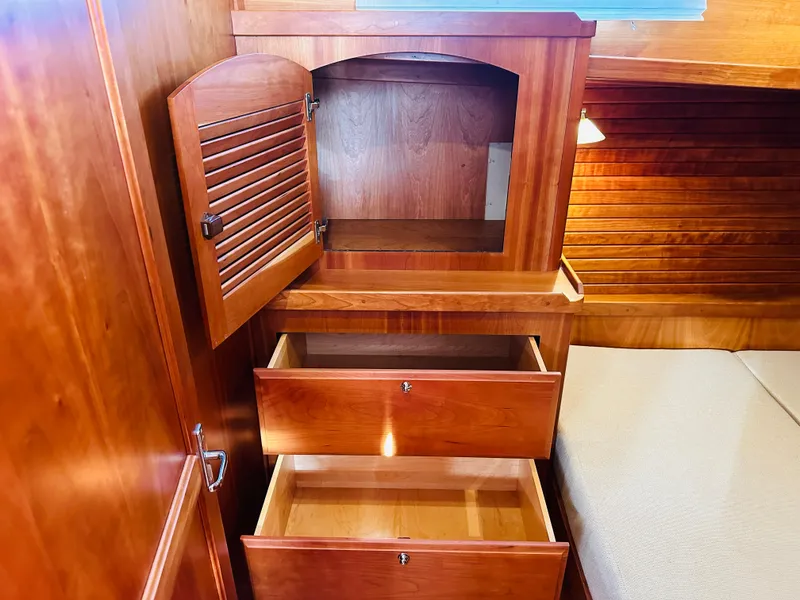 Slide: The Image of Wooden cabinetry and drawers in 2009 Sabre 42 Hardtop Express interior. - 45