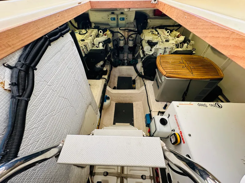 Slide: The Image of Engine room of 2009 Sabre 42 Hardtop Express with dual engines and equipment. - 47
