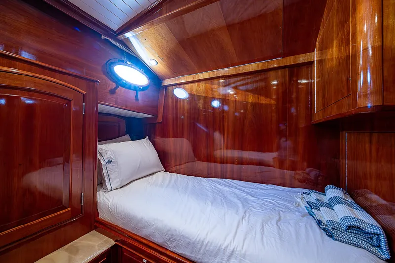 Slide: The Image of Luxurious cabin interior of 2005 Hinckley Talaria 55 MY yacht with polished wood finish. - 30