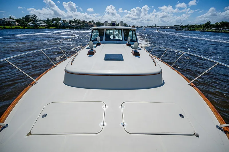 Slide: The Image of 2005 Hinckley Talaria 55 MY yacht cruising on a sunny day with clear skies. - 35