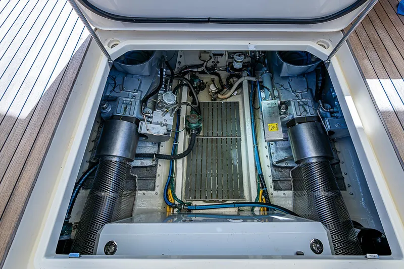 Slide: The Image of Engine compartment of 2005 Hinckley Talaria 55 MY yacht, showcasing mechanical components. - 43