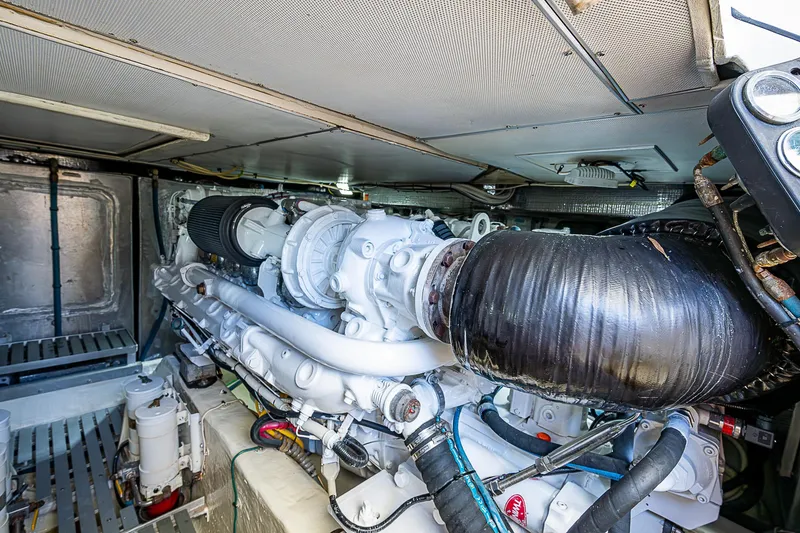 Slide: The Image of Engine room of 2005 Hinckley Talaria 55 MY yacht, showcasing detailed machinery and components. - 46