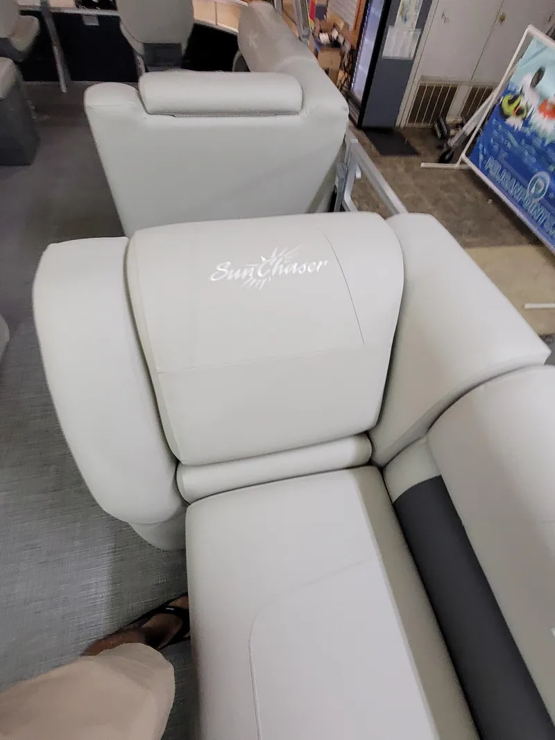 Slide: The Image of 2025 SunChaser Vista 22 Fish boat interior with plush seating. - 13