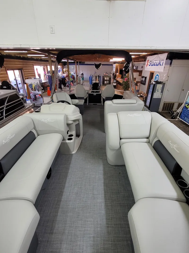 Slide: The Image of 2025 SunChaser Vista 22 Fish pontoon boat interior with spacious seating and modern design. - 5