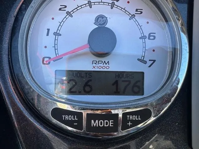 Slide: The Image of Ranger RP243C 2021 dashboard showing RPM gauge, voltage, and hours. - 11