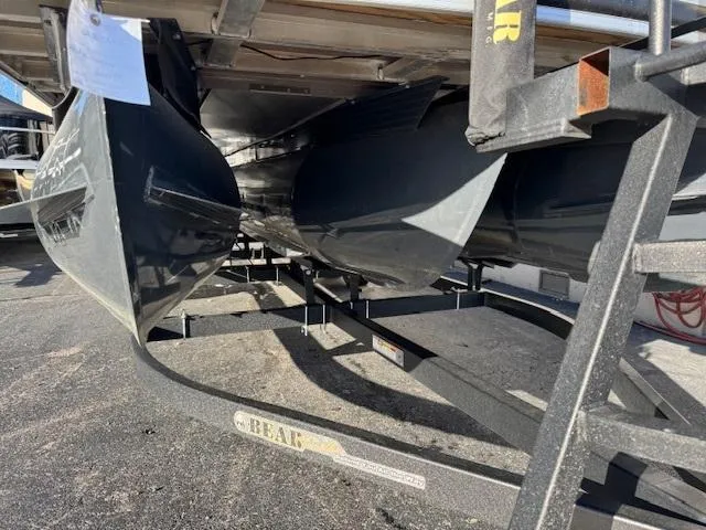 Slide: The Image of 2021 Ranger RP243C pontoon boat on trailer, underside view. - 12