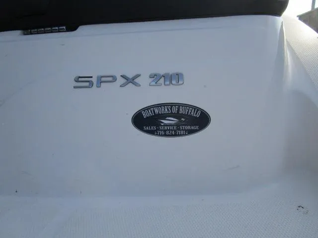 Slide: The Image of 2021 Sea Ray 210 SPX boat with Boatworks of Buffalo sticker. - 14