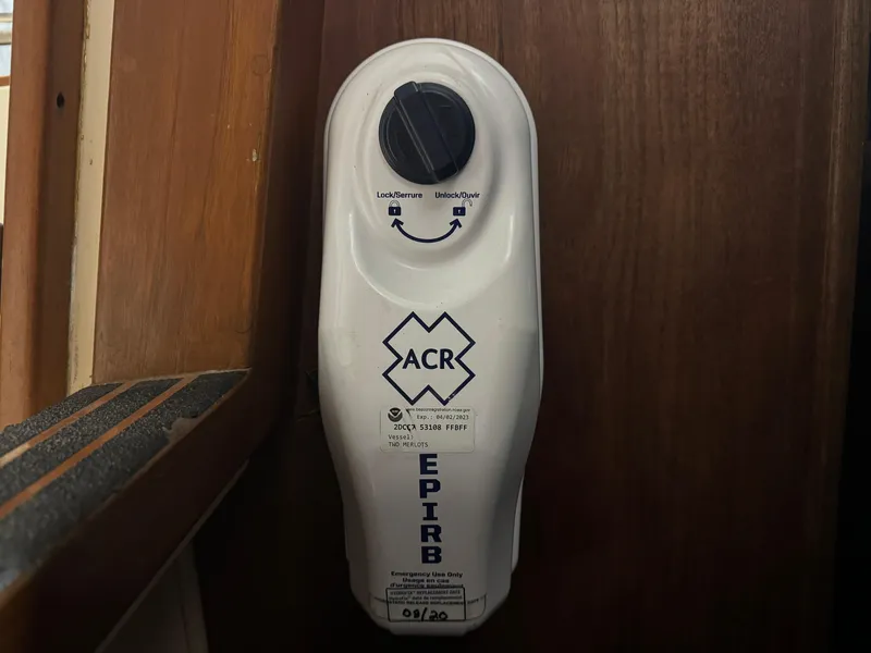 Slide: The Image of ACR EPIRB device on 1997 Island Packet 350 sailboat interior. - 22