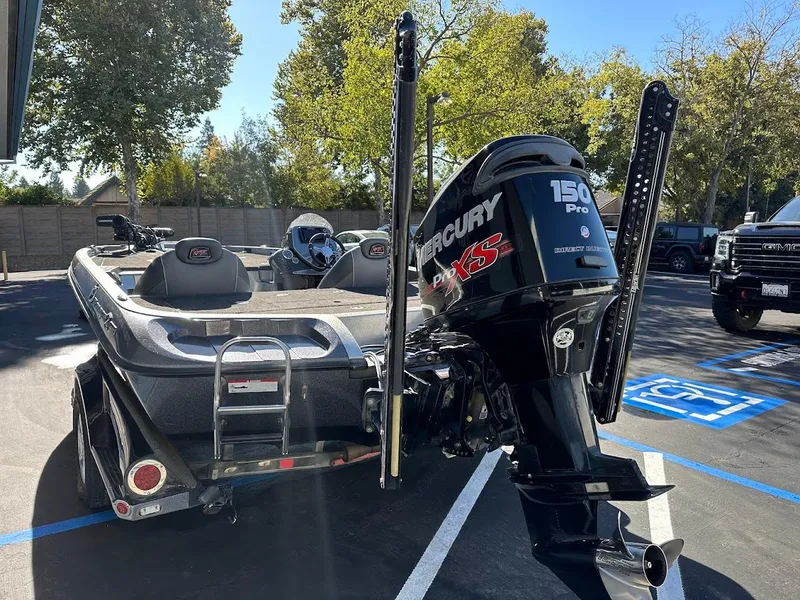 Slide: The Image of 2017 Ranger Z518 boat with Mercury 150 Pro XS engine in parking lot. - 13